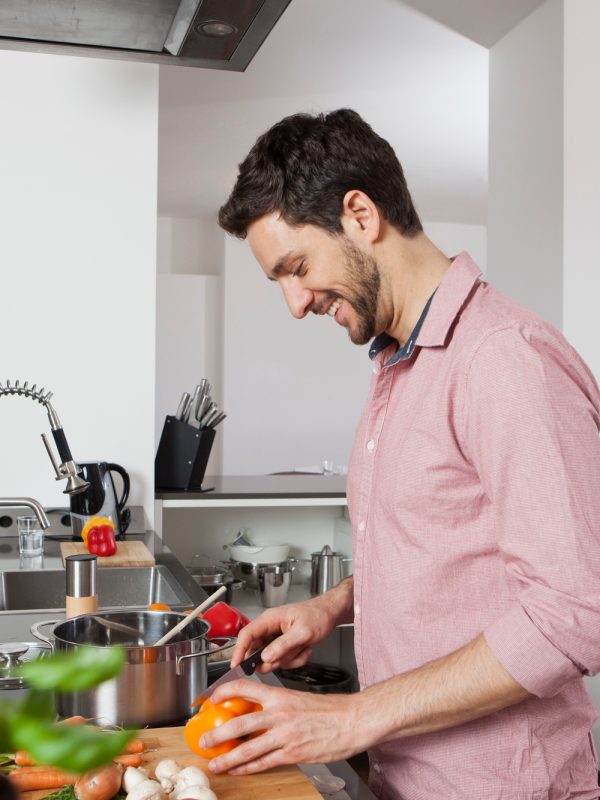 Man cooking in kitchen